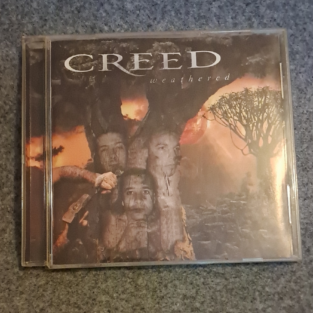 Creed Weathered CD - Black and Orange Cover